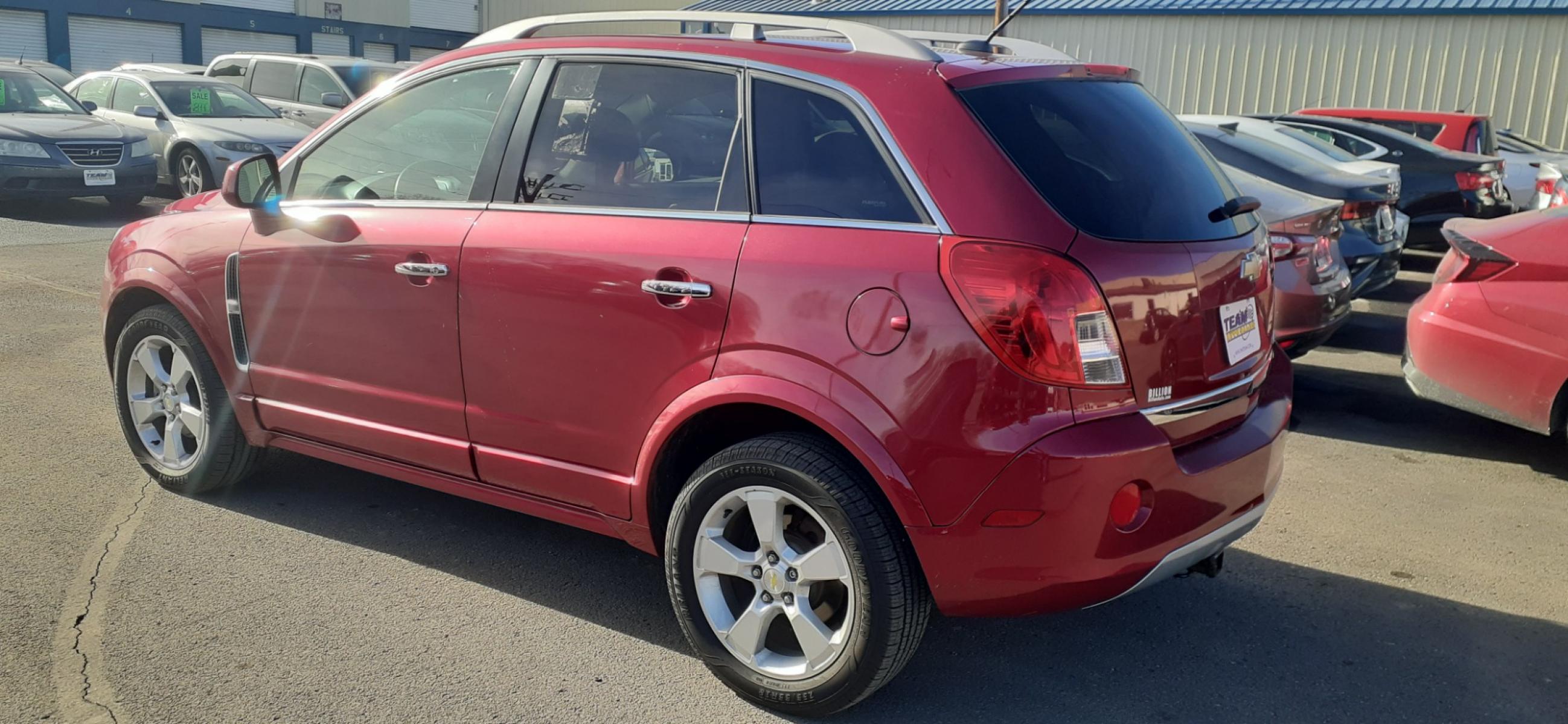 2014 Chevrolet Captiva Sport 1LT FWD (3GNAL3EK3ES) with an 2.4L L4 DOHC 16V FFV engine, 6-Speed Automatic transmission, located at 2015 Cambell Street, Rapid City, SD, 57701, (605) 342-8326, 44.066433, -103.191772 - CARFAX AVAILABLE - Photo #2